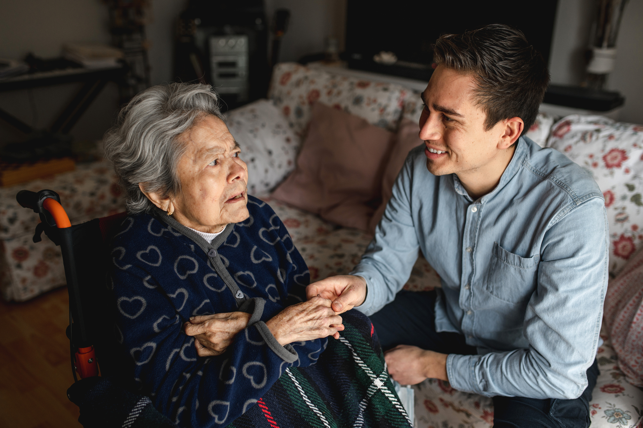 Senior with dementia getting support from family