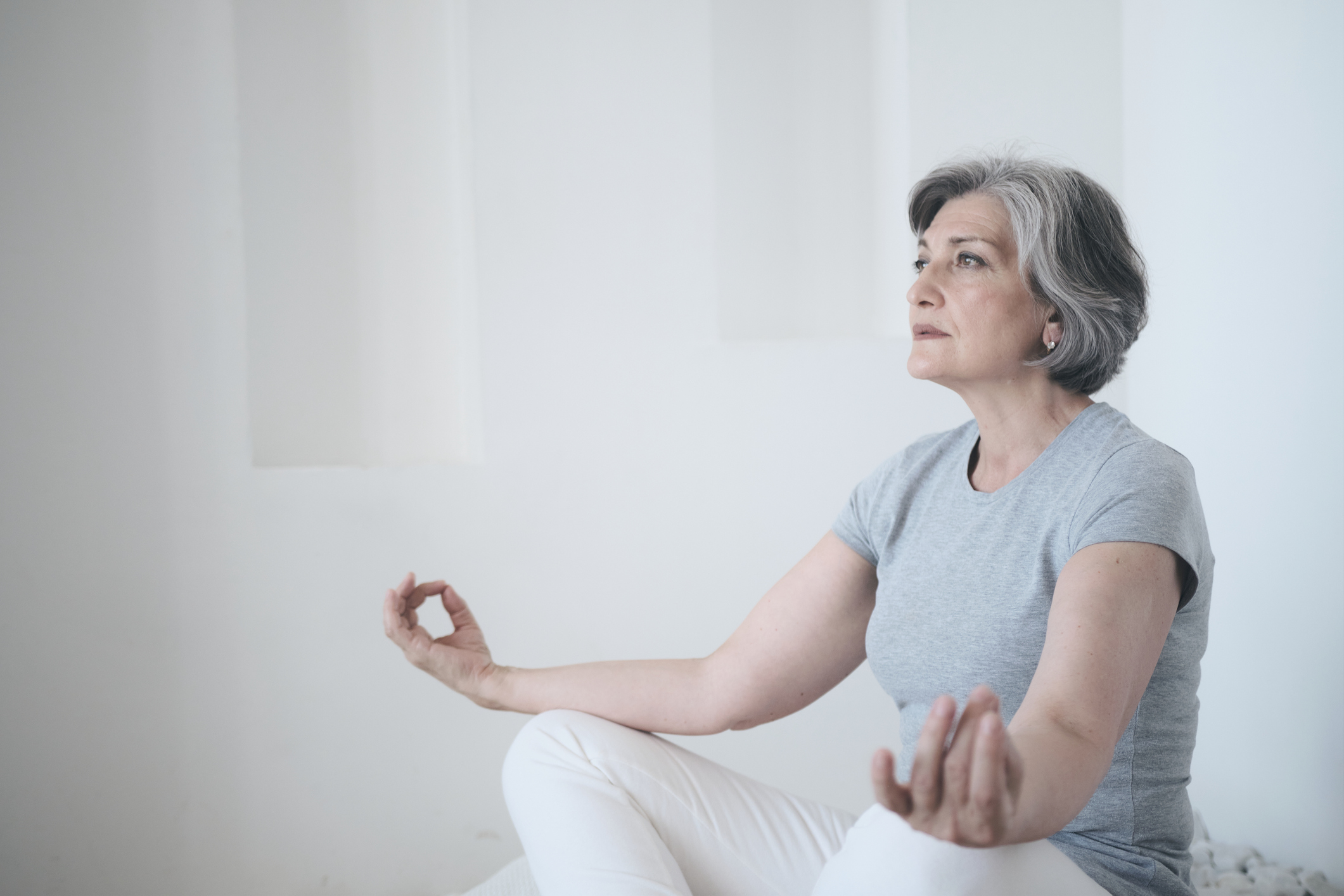 Old woman exercising to promote healthy lungs